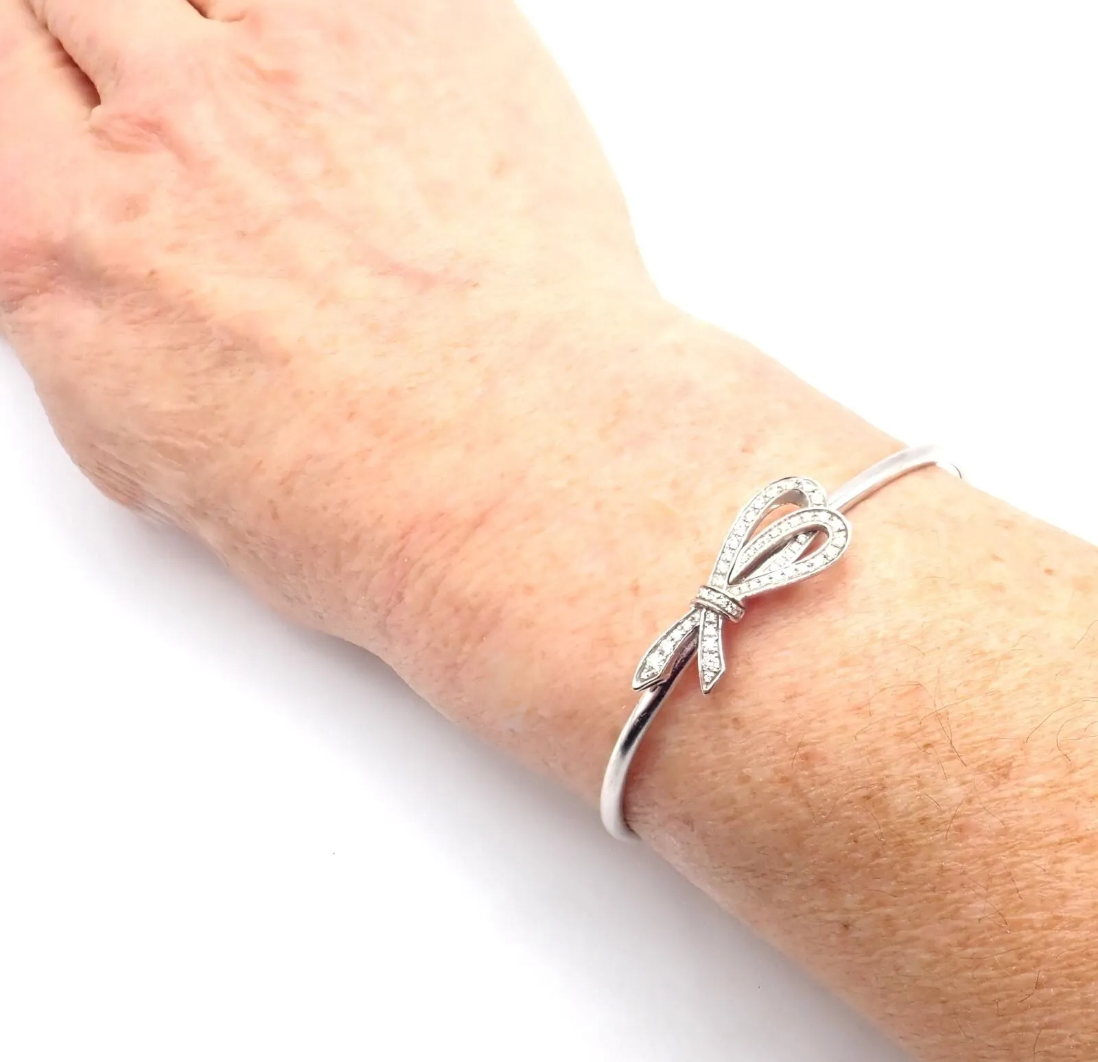 Authentic! Tiffany & Co 18k White Gold Diamond Bow Ribbon Bangle Cuff Bracelet
